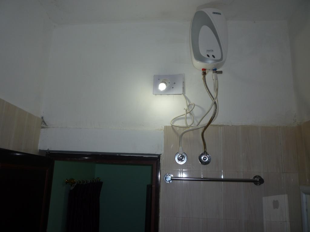 Hotel Nirmal Inn Бхубанешвара Экстерьер фото